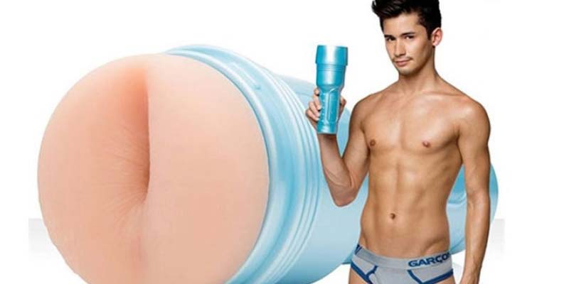 Man holding gay sex toy